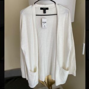 Long sweater cardigan With pockets